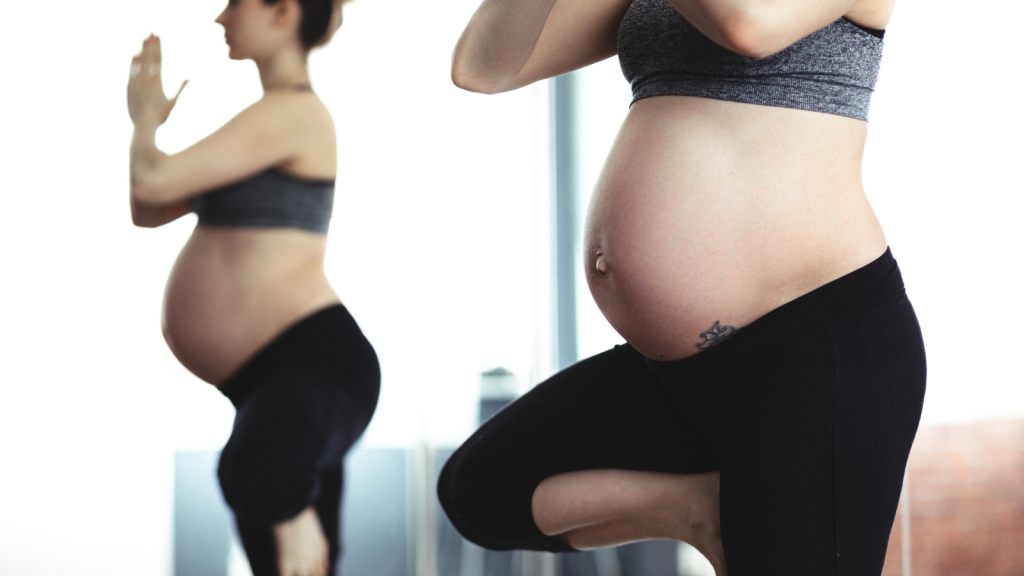 pregnant people in a yoga class